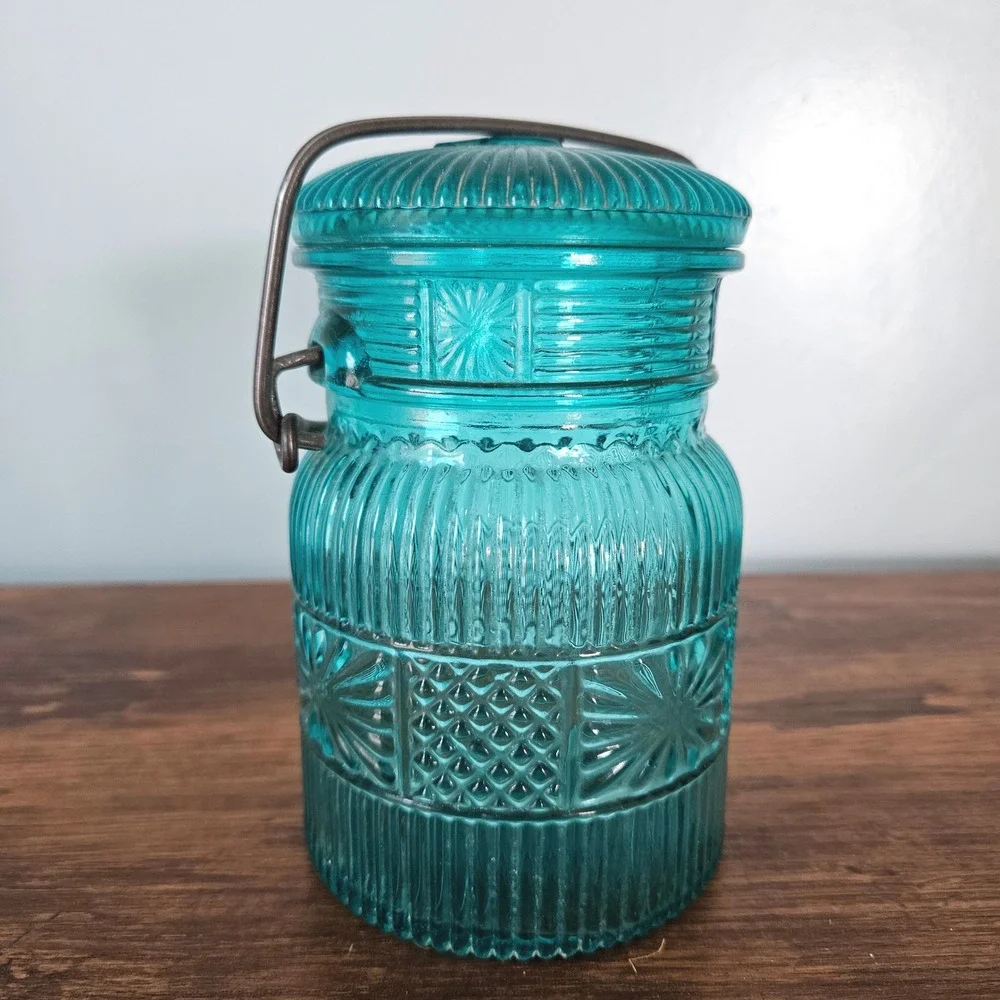 Vintage Avon Teal Blue Glass Jar Wire Bail Handle Sunburst Daisy Button Pattern